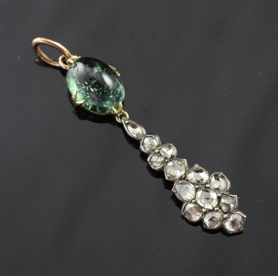 A late Victorian 15ct gold and silver, cabochon green tourmaline? and diamond drop pendant, 1.75in.